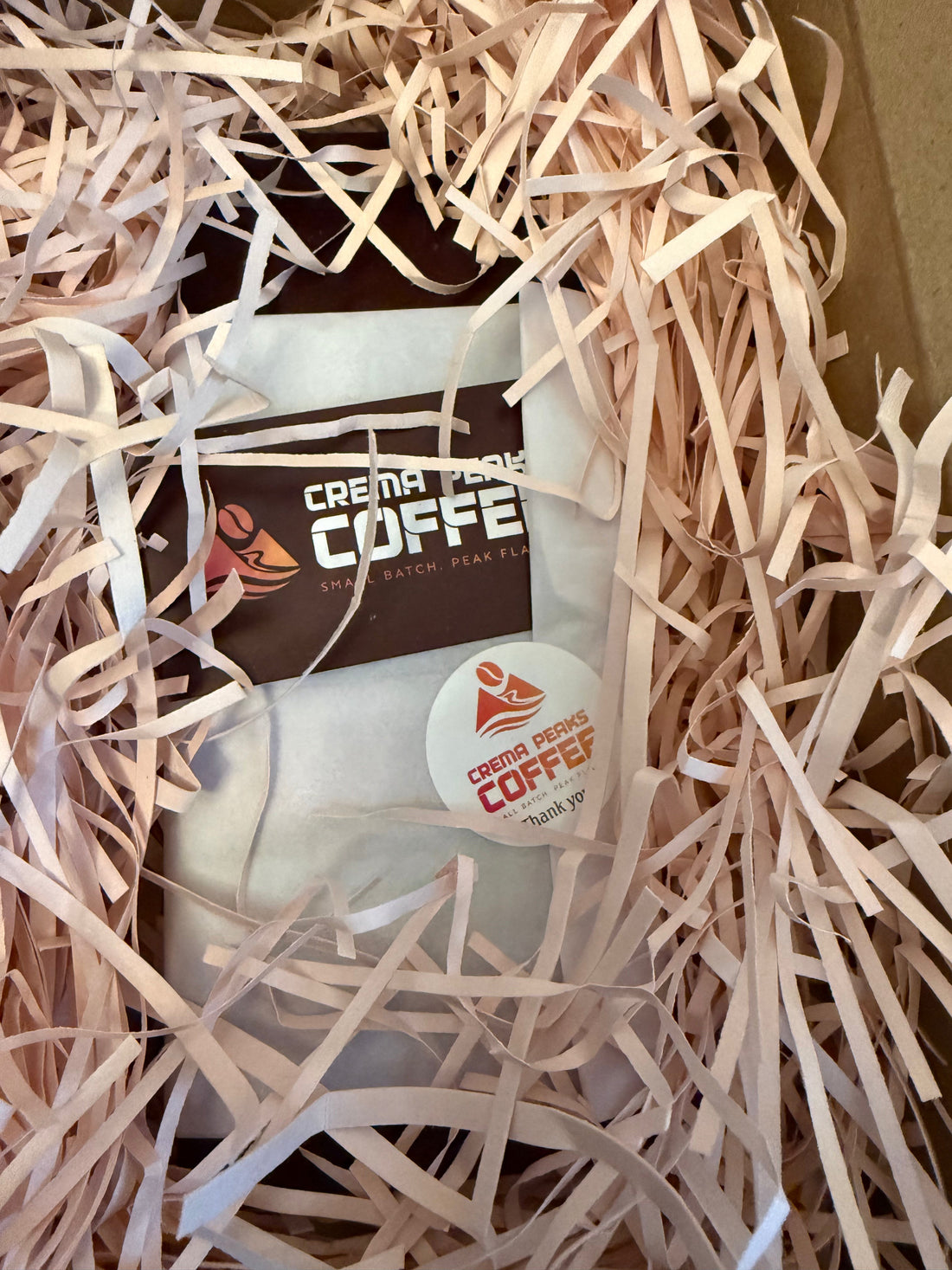 A Crema Peaks subscription package with card and thank you sticker 