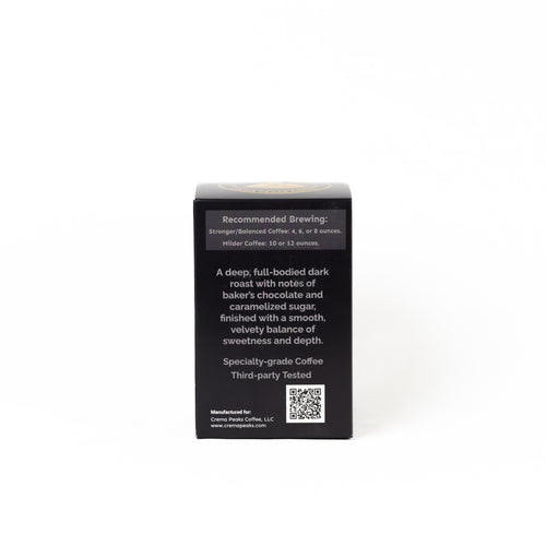 The back of a coffee box on a plain white background, showing brewing recommendations, product description, a QR code, and manufacturer details.