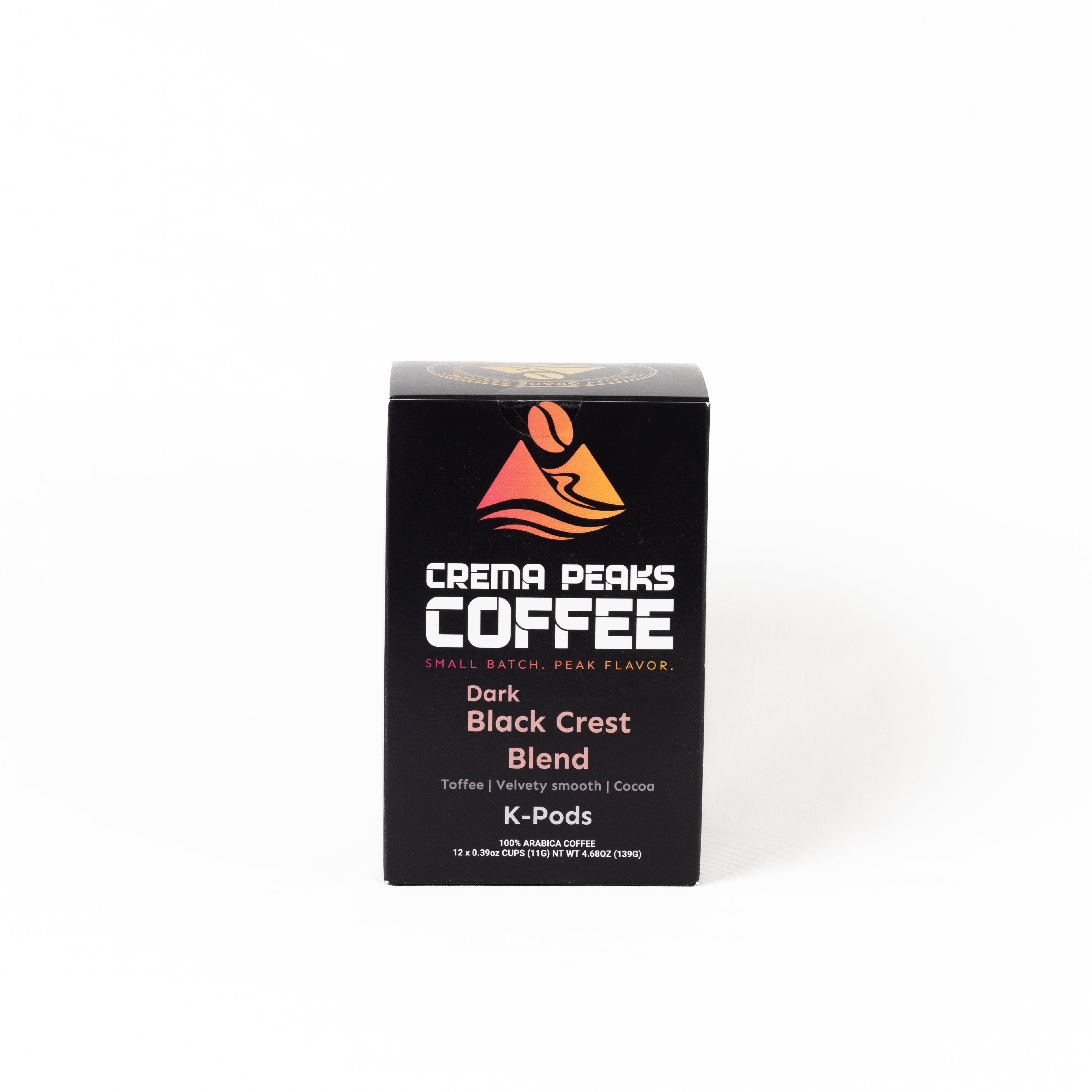 A black box of Crema Peaks Coffee Dark Black Crest Blend K-Pods on a clean white background.