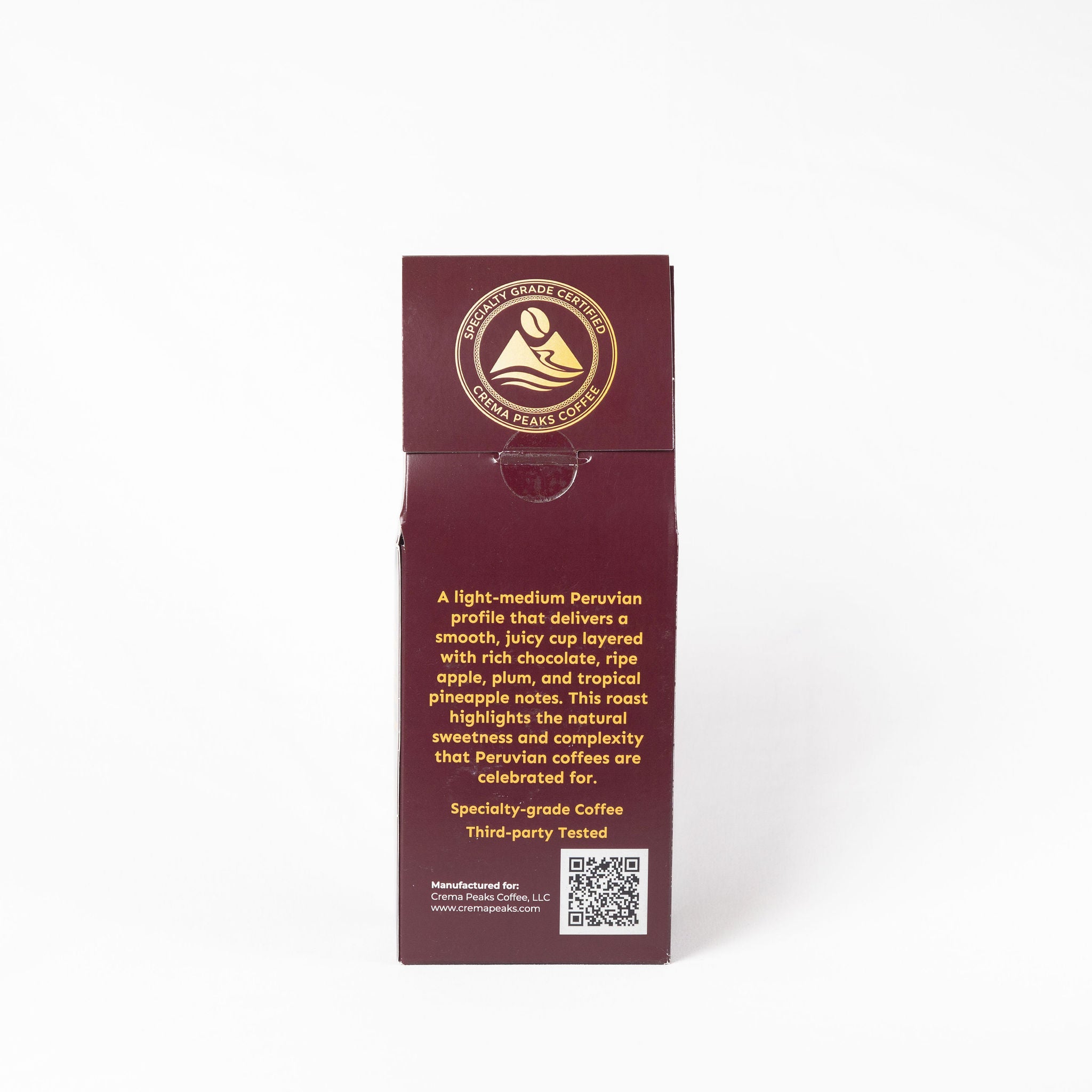 A tall, narrow dark burgundy coffee bag package with gold printed text and logo, photographed upright on a clean white background. The front shows a circular coffee bean illustration and the brand name 'Café Roasted & Served'.