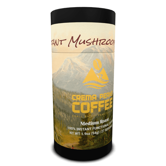 Canister of Crema Peaks Coffee with logo and mountain graphic on a black background, 1.9oz size medium roast