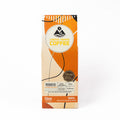 A 12oz bag of Crema Peaks Coffee 'Mindful' innovative blended coffee, featuring an orange and beige geometric design with black accents on a white background.