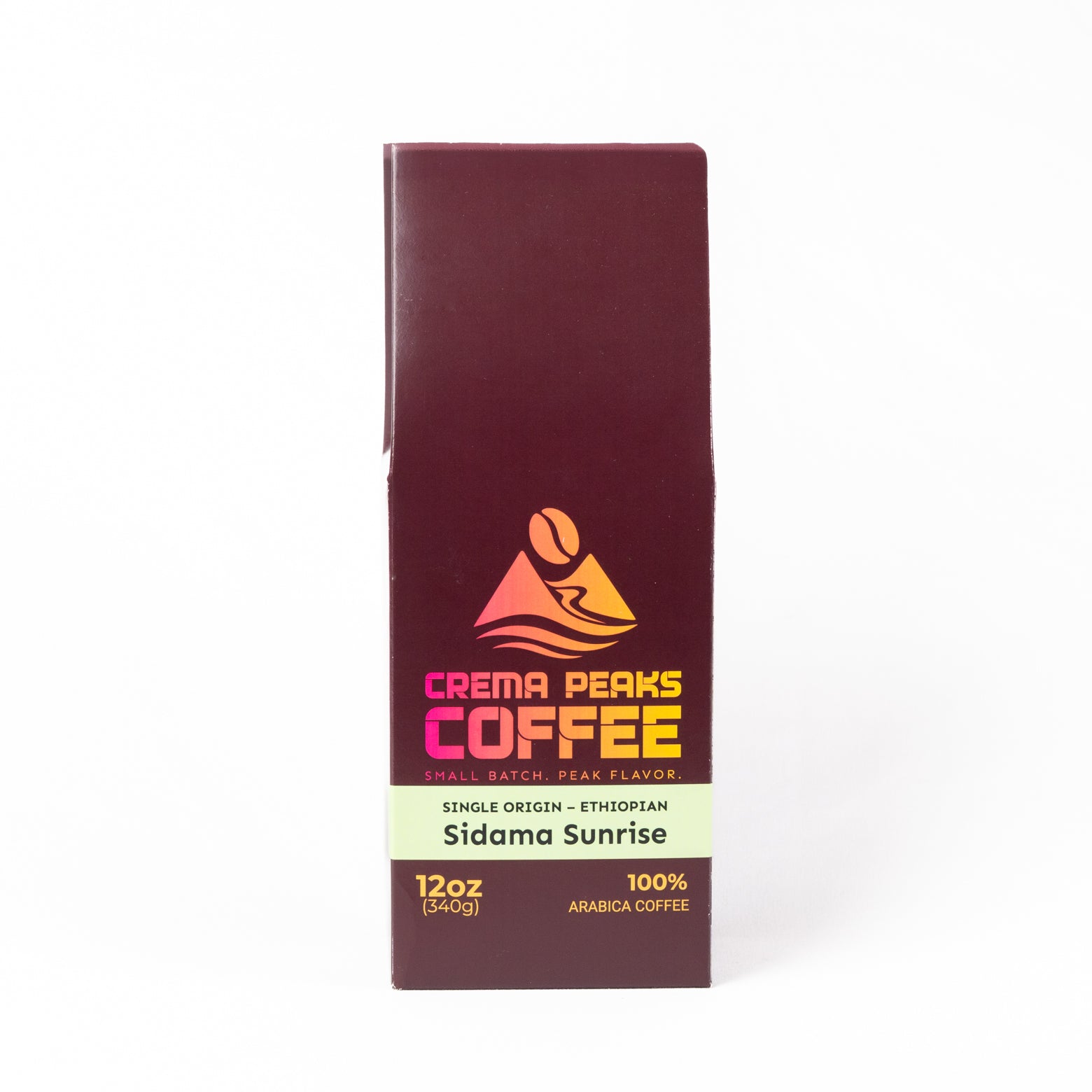 A tall rectangular coffee bag package for Crema Peaks Coffee, Sidama Sunrise, shown upright on a clean white background. The package is dark burgundy with a cream band and orange/yellow logo and text.