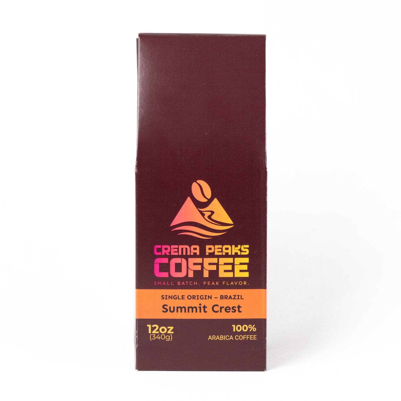 A tall, narrow package of Crema Peaks Coffee Summit Crest single-origin coffee on a plain white background.